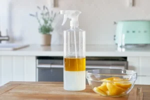 Homemade natural cleaning solutions in bottles.