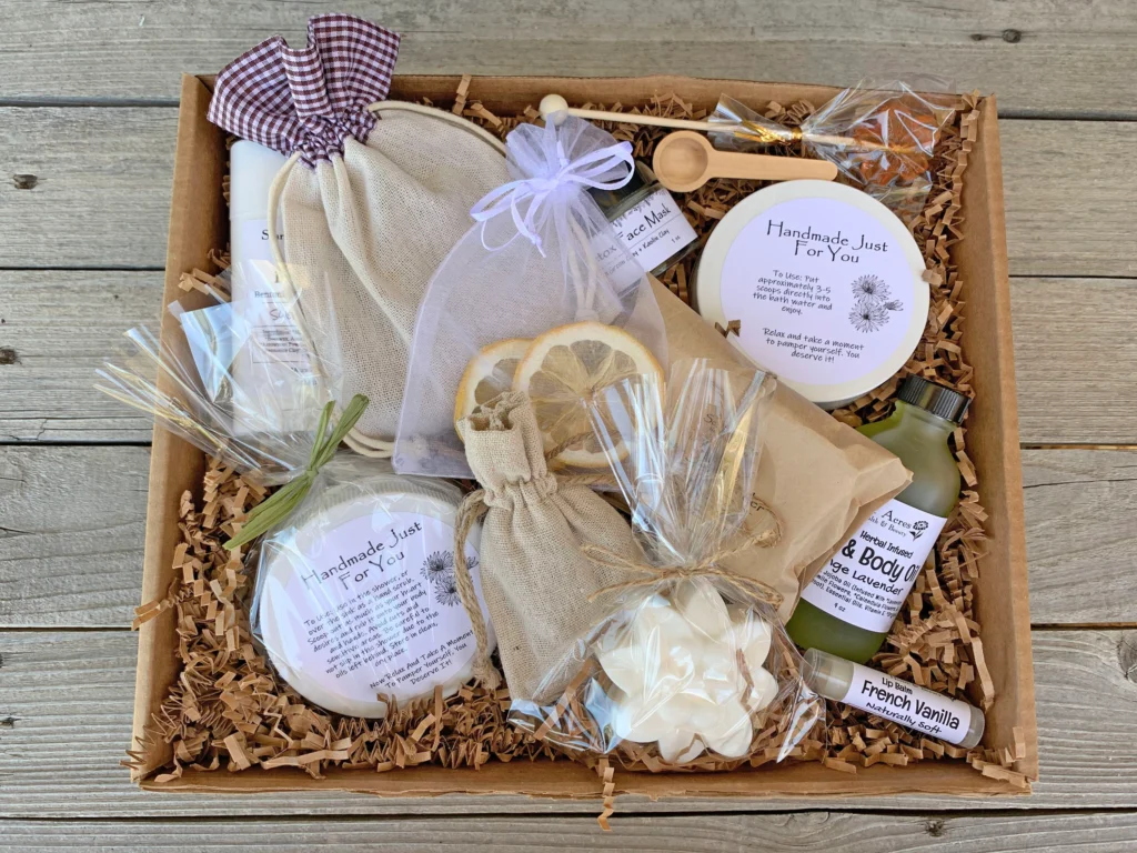 Gift basket with snacks and personal care items, wrapped with a thank-you note.