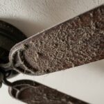“Dusty ceiling fan blades before cleaning”
