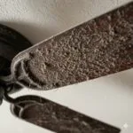 “Dusty ceiling fan blades before cleaning”